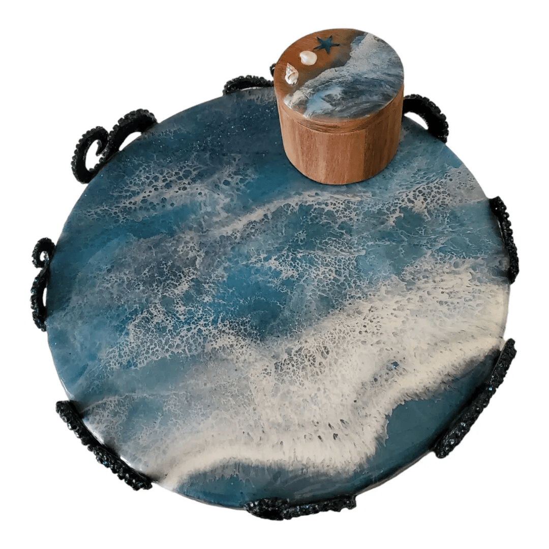  
  Dragonfly Wood and Resin Designs: BOOTH      Ocean-inspired home decor handcrafted from wood and resin. Discover lazy susans, serving trays, wine and whisky glasses, shot glasses, canisters, mirrors, floating shelves, and more, each piece bringin