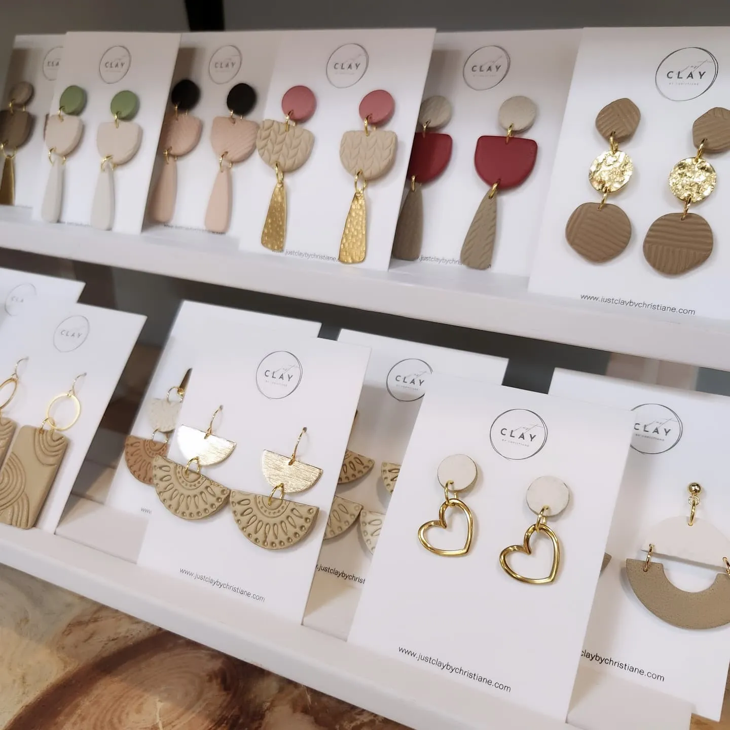  
  Just Clay by Christiane: BOOTH 522
      Handmade polymer clay earrings in a wonderful variety of styles and designs. From elegant and everyday dangles, hoops, and studs to a wide range of seasonal favorites, each pair is crafted with high-qualit
