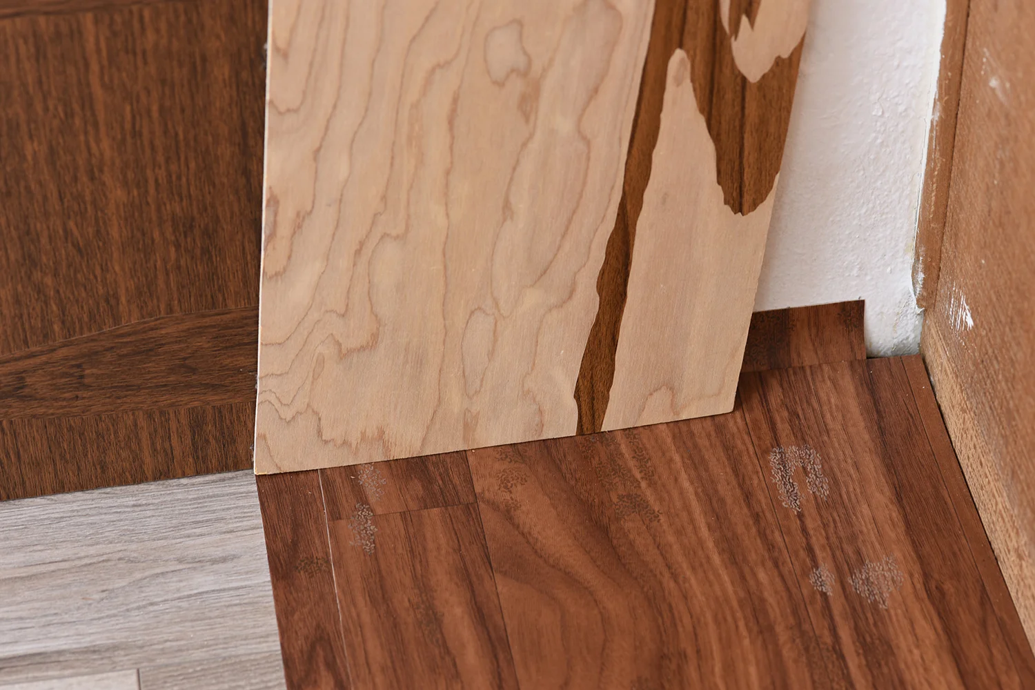 Masquetry V (detail), 2014–2018 Adhesive vinyl on found laminate and wood Stain Paintings , 2018 Acrylic on found vinyl flooring