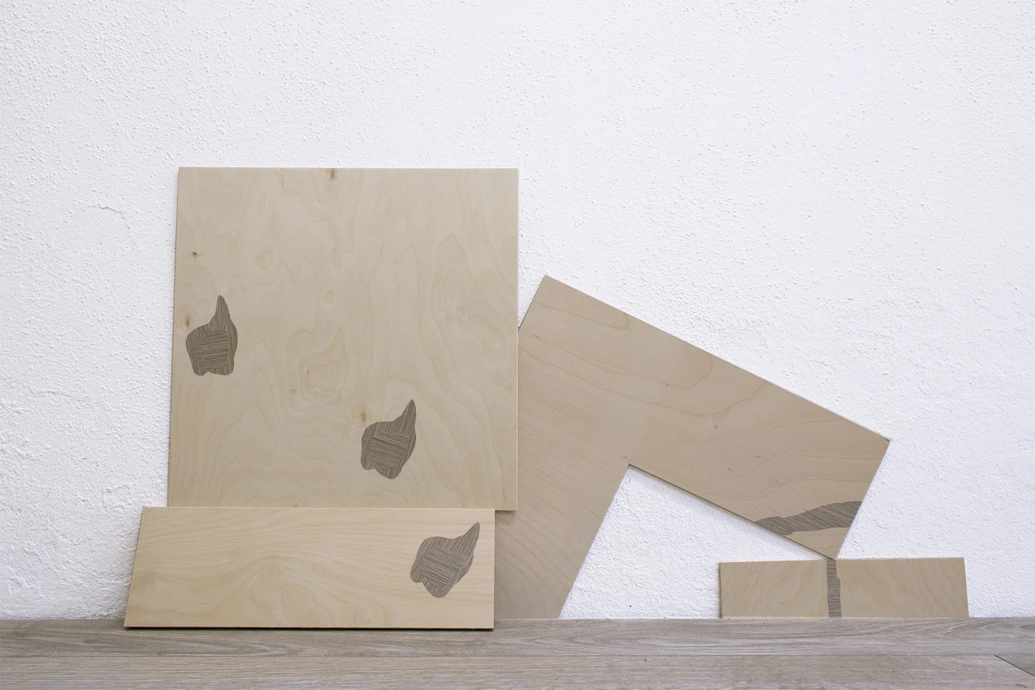 Masquetry V (detail), 2014–2018 Adhesive vinyl on found laminate and wood Dimensions variable