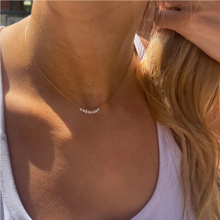 Screenshot 2023-05-20 at 10-50-57 Nina Dainty Pearl Necklace.png