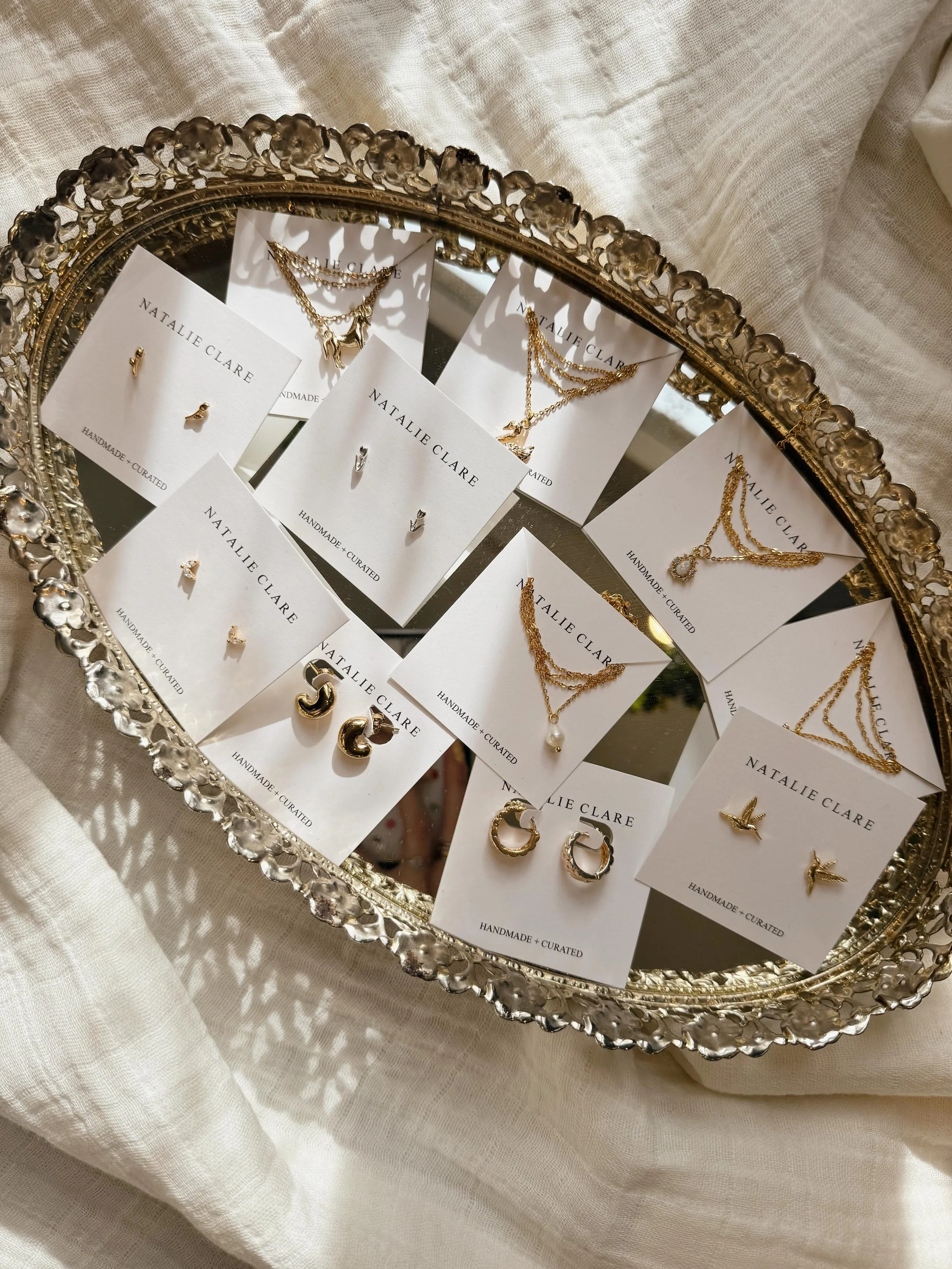 The finishing touch to your Belmont look✨ Shop our new jewelry line in store🤍
&bull;
&bull;
&bull;
#natalieclaire #jewelry #belmontstakes #saratogasprings #shopsmall