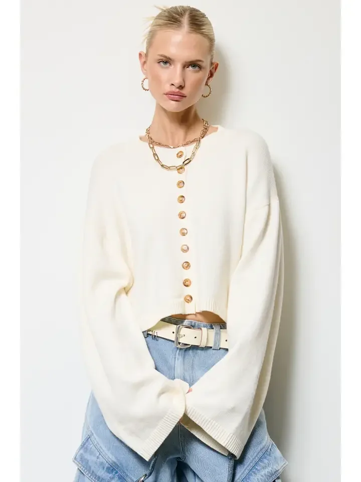 Front view of the button front cropped cardigan in bone