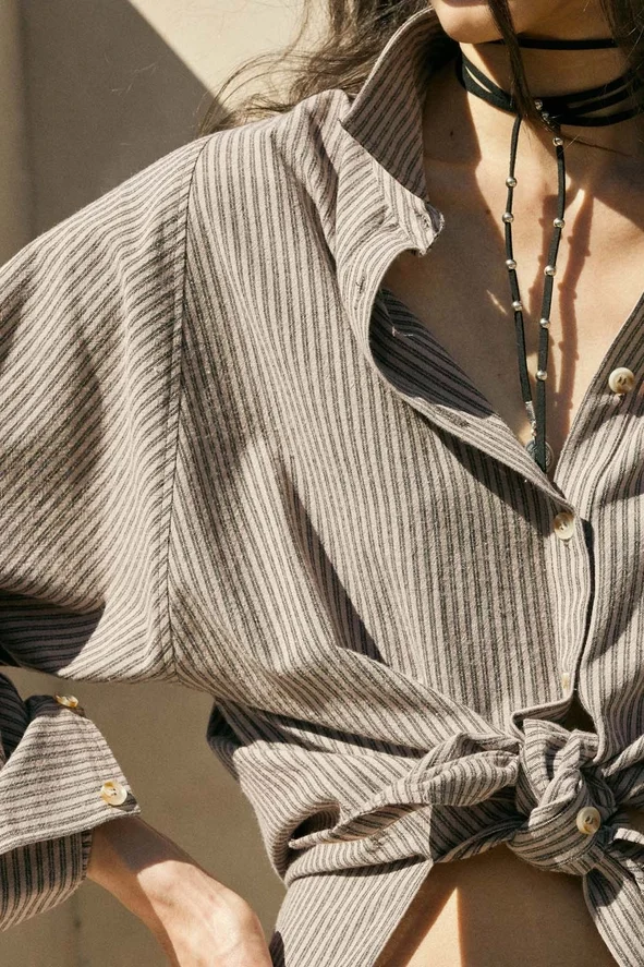 Promesa Mocha shirt close.webp