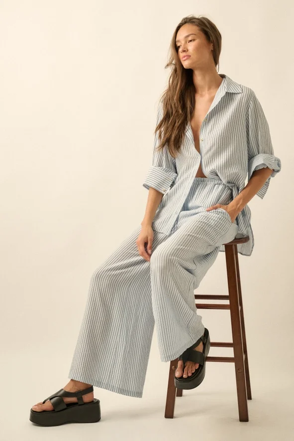 Promesa pale blue sitting .webp