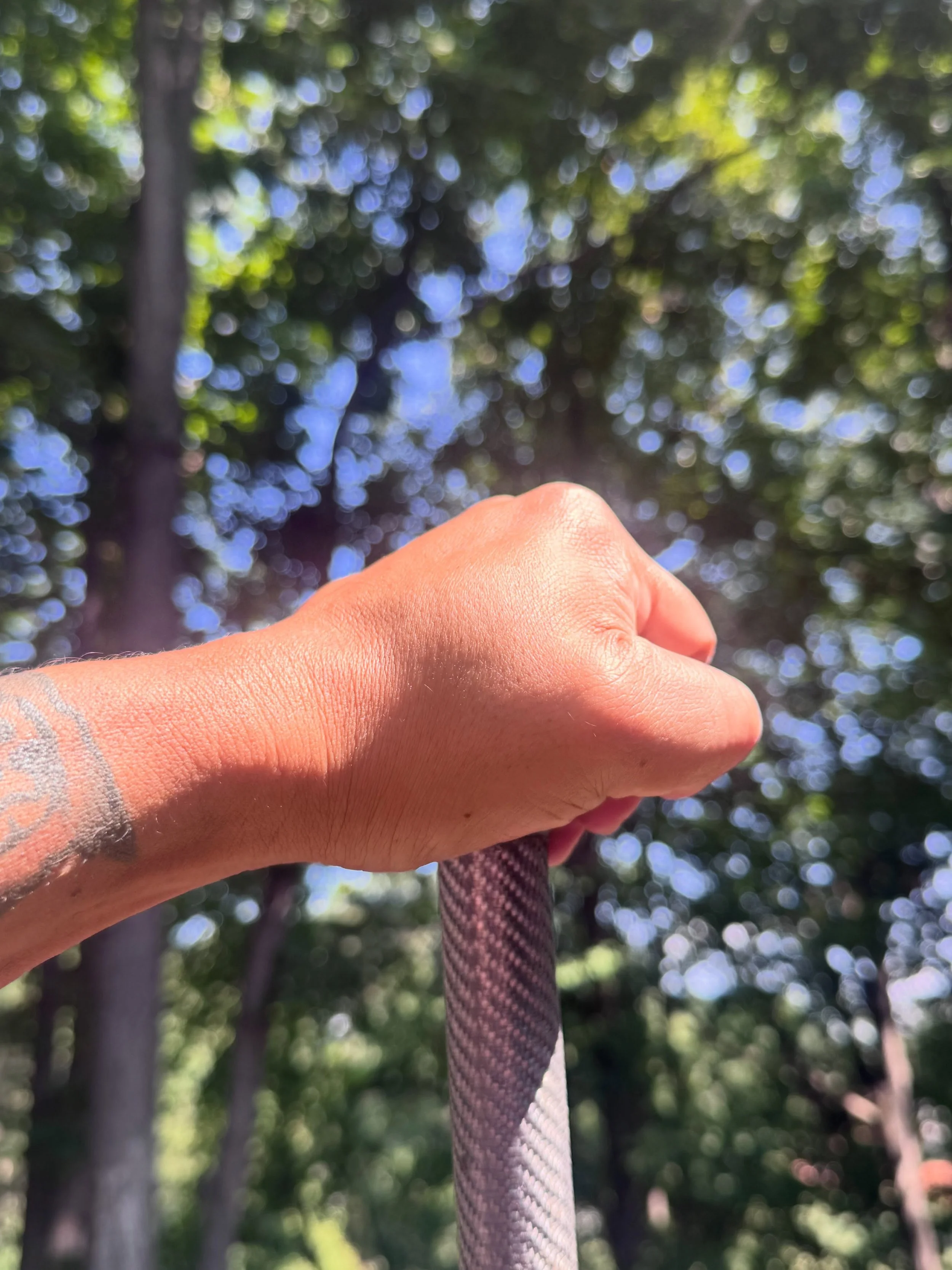 The Top Hand 👊

Most of us will use the hand grip in first pic for most of the time. Some will mix in the grip shown in second pic.  Regardless, grip is important in paddling for sure!

Most of us will agree that the top hand is not simply pushing t