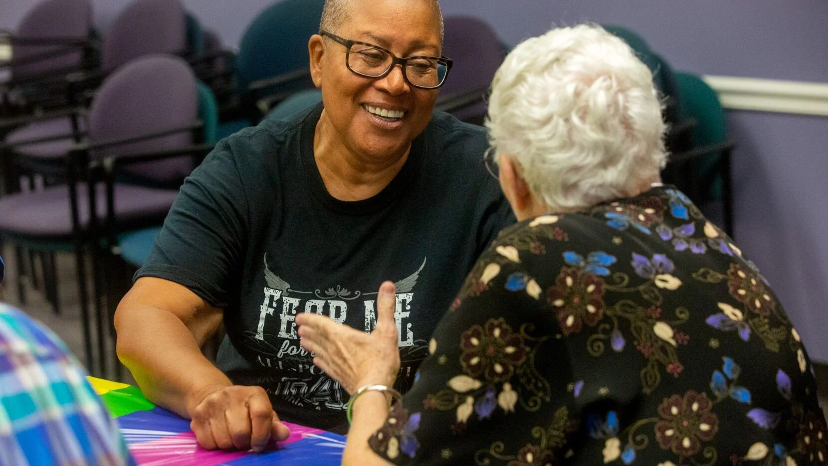 Silver Pride Project coordinator Portia Cantrell, left, chats with Marion Hayes during a Coffee & Convo gathering of the Silver Pride Project at the Oak Lawn Library in Dallas Sept. 30. The project hosts weekly social events and recreational activities for senior members of the LGBTQ community.(Lynda M. Gonzalez / Staff Photographer)