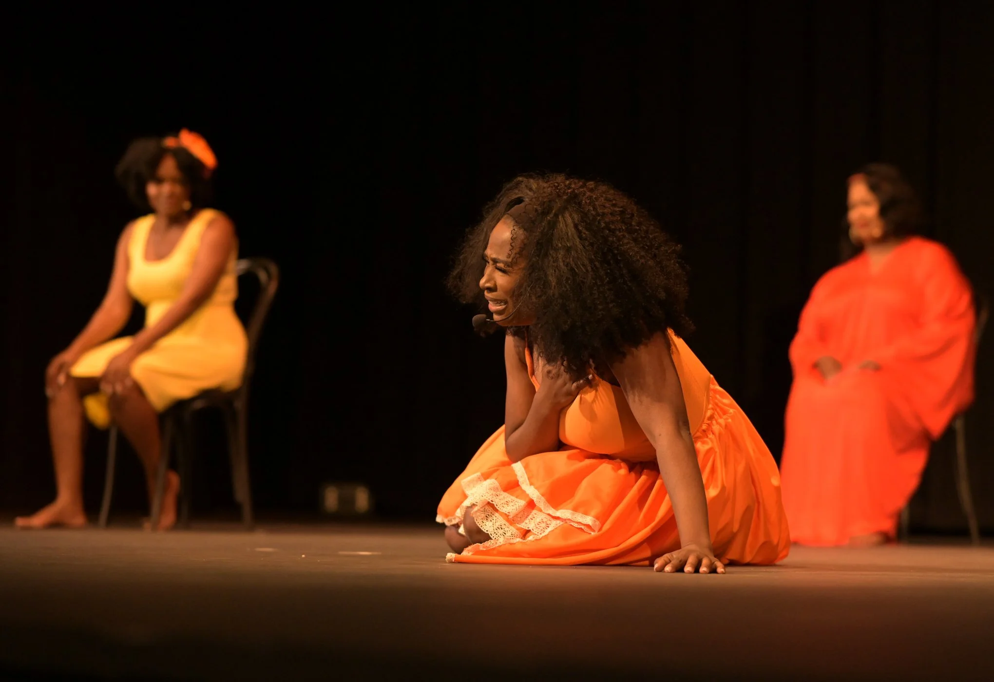  Girl in orange on the floor is Colette Parker with Demetria Sherman (yellow) and Caline Newton (red) in the background. 