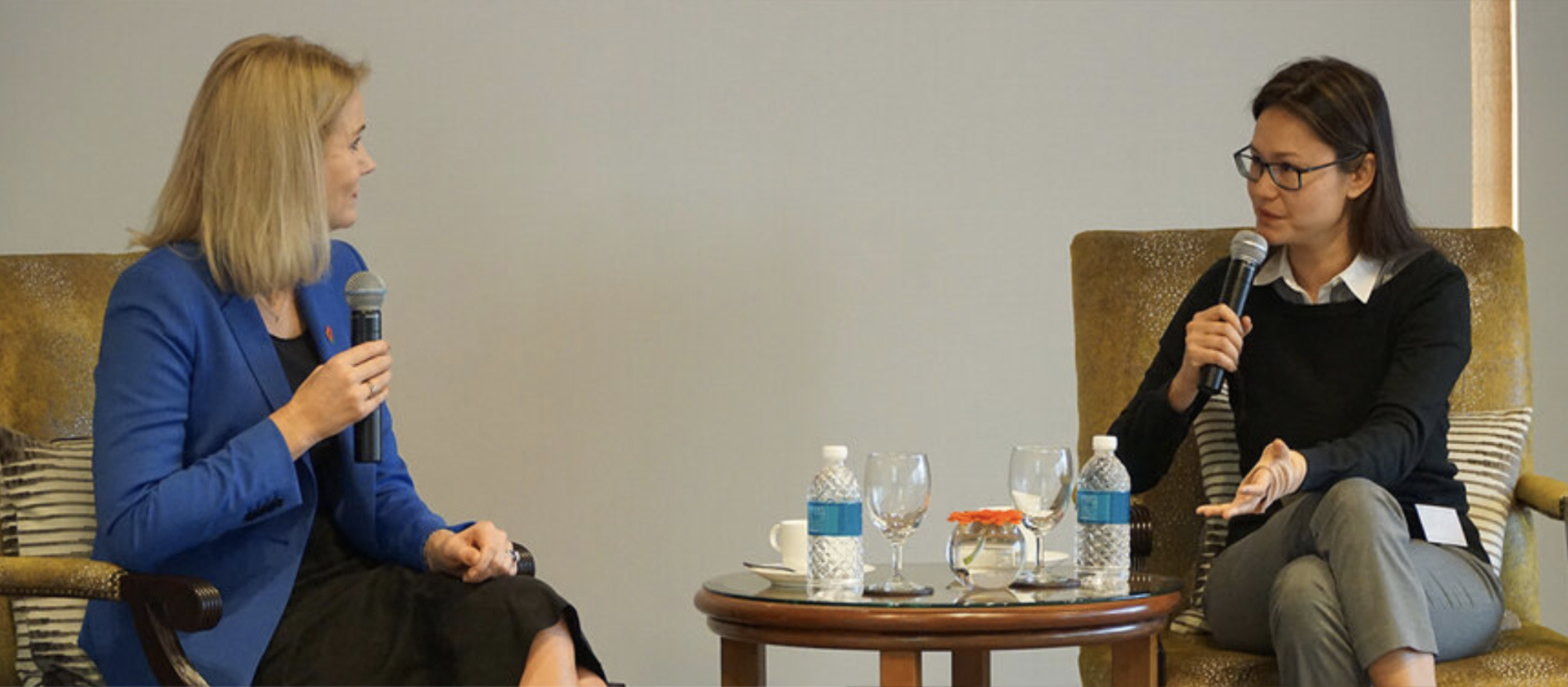 Eunice moderates a dialogue with Helle Thoming Schmidt, the former Prime Minister of Denmark.