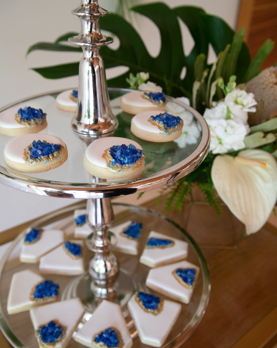 Stylish White and Blue crystal cookies on platter