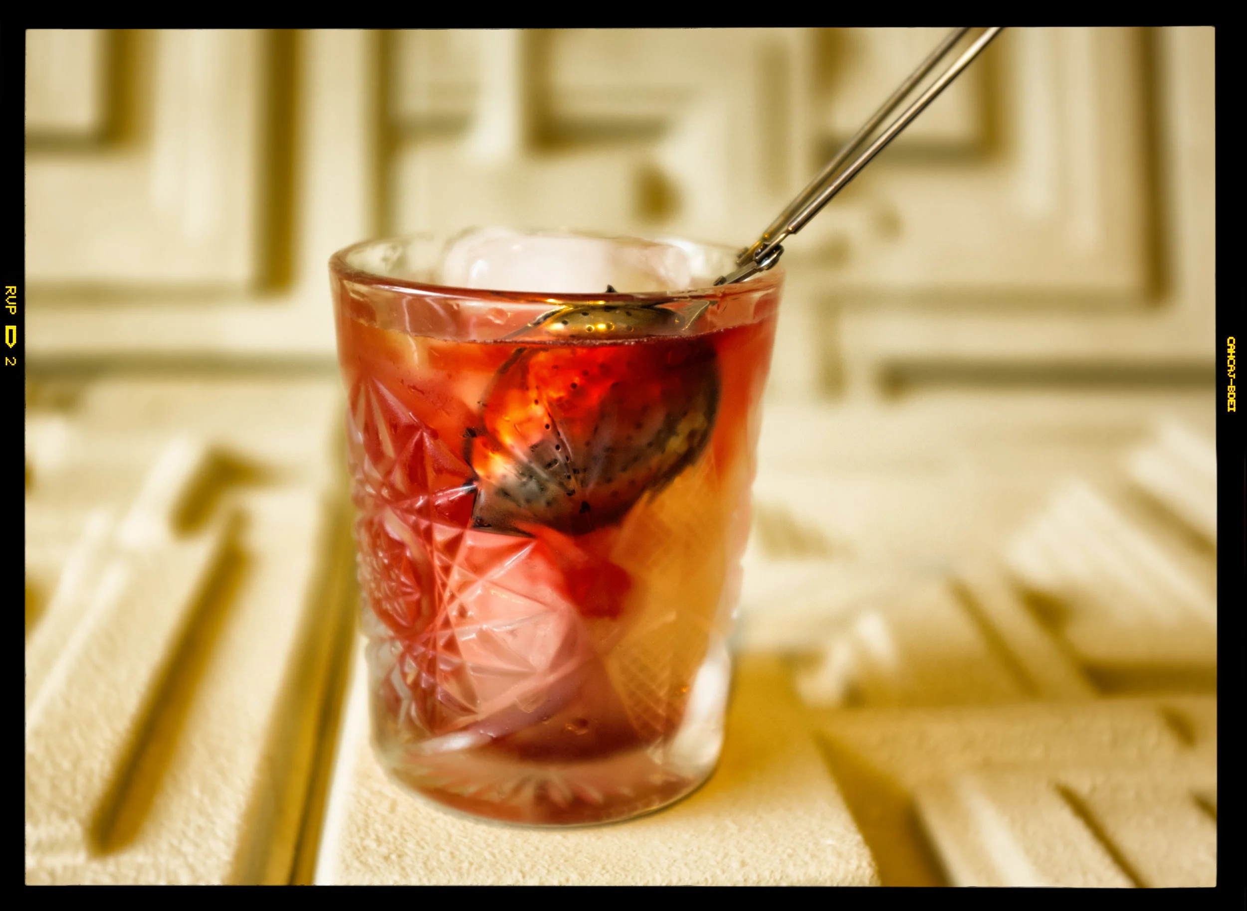 Neotropolis Bar’s clarified milk punch Long Island iced tea-inspired drink, with a hibiscus infusion that "bleeds". Tequila, vodka, Rum, gin, triple sec, lemon, cola. Cocktail created by BC Hoffman.