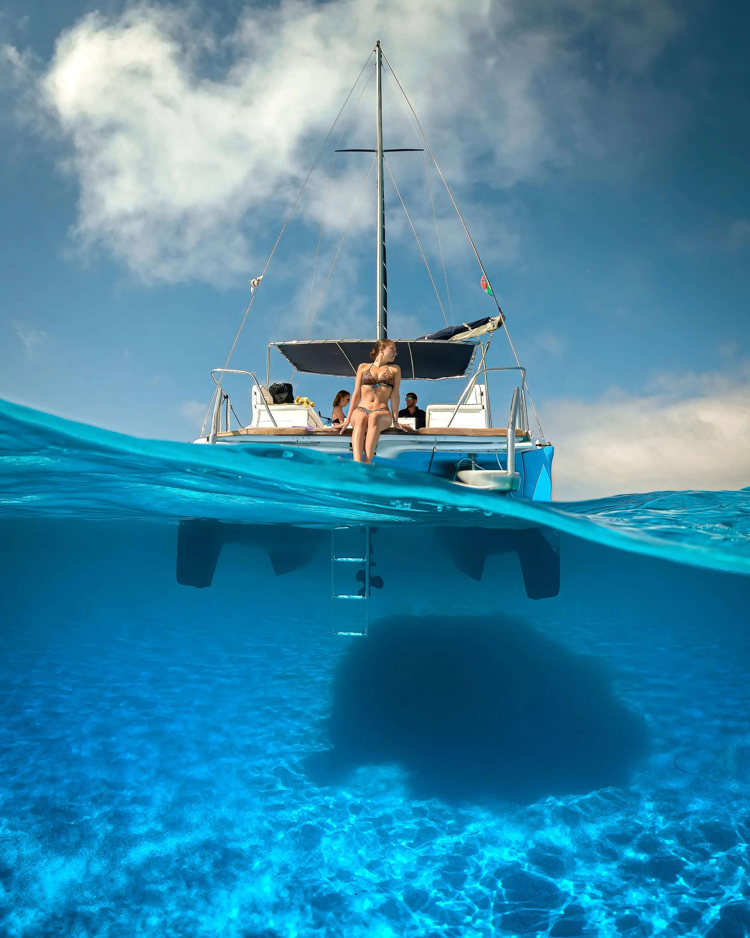 white_and_blue_sailboat_on_blue_sea_under_blue_sky-scopio-05f339f4-c40c-41bd-aaa4-aa12bf96a6e1.jpg