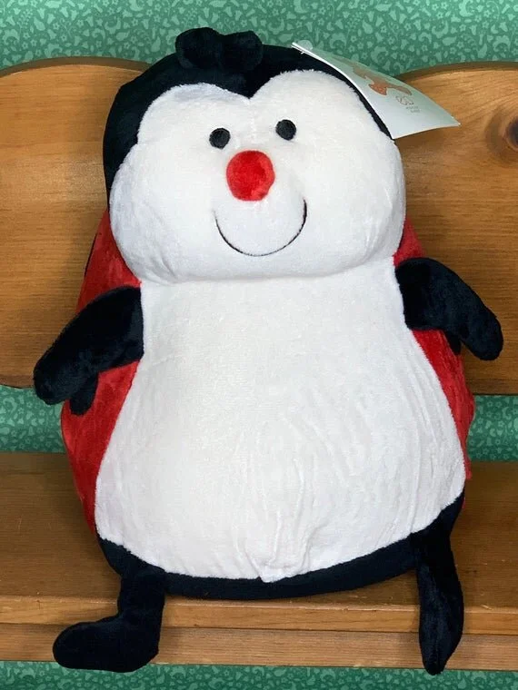 clintons penguin soft toy