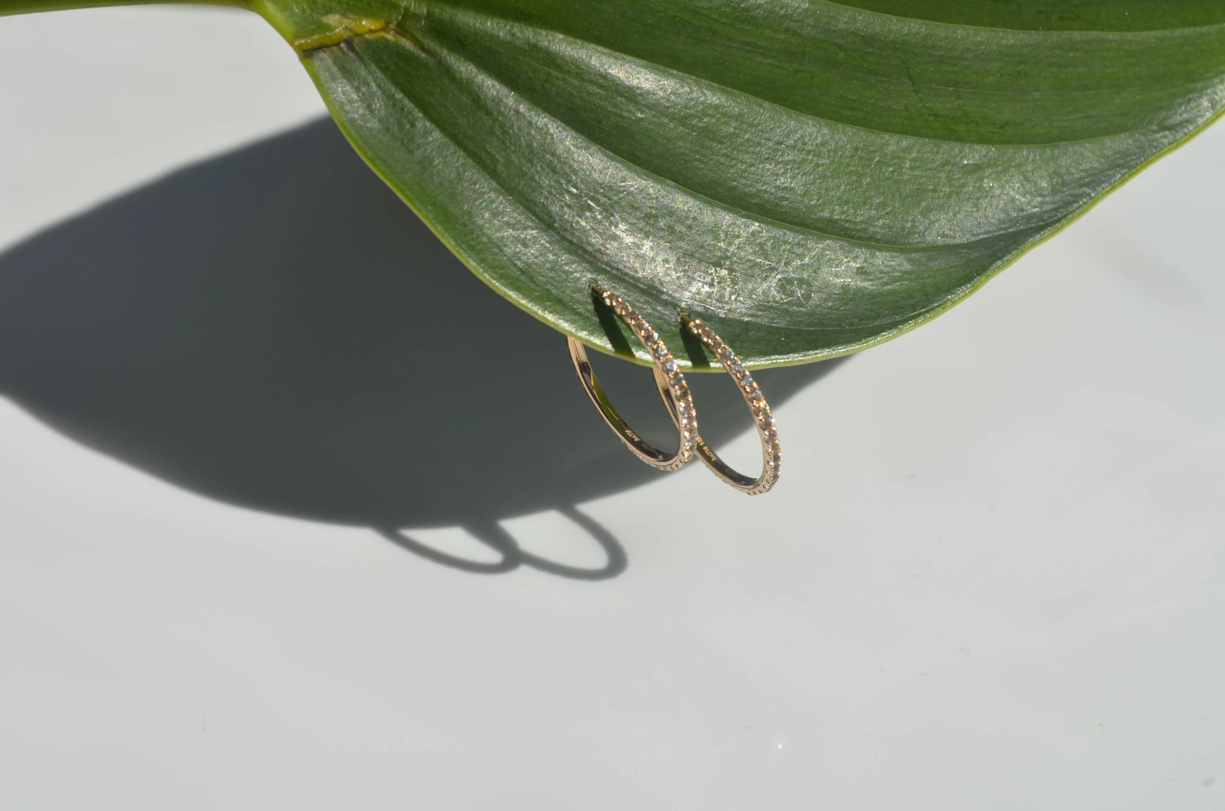 Rose gold light green sapphire earrings
