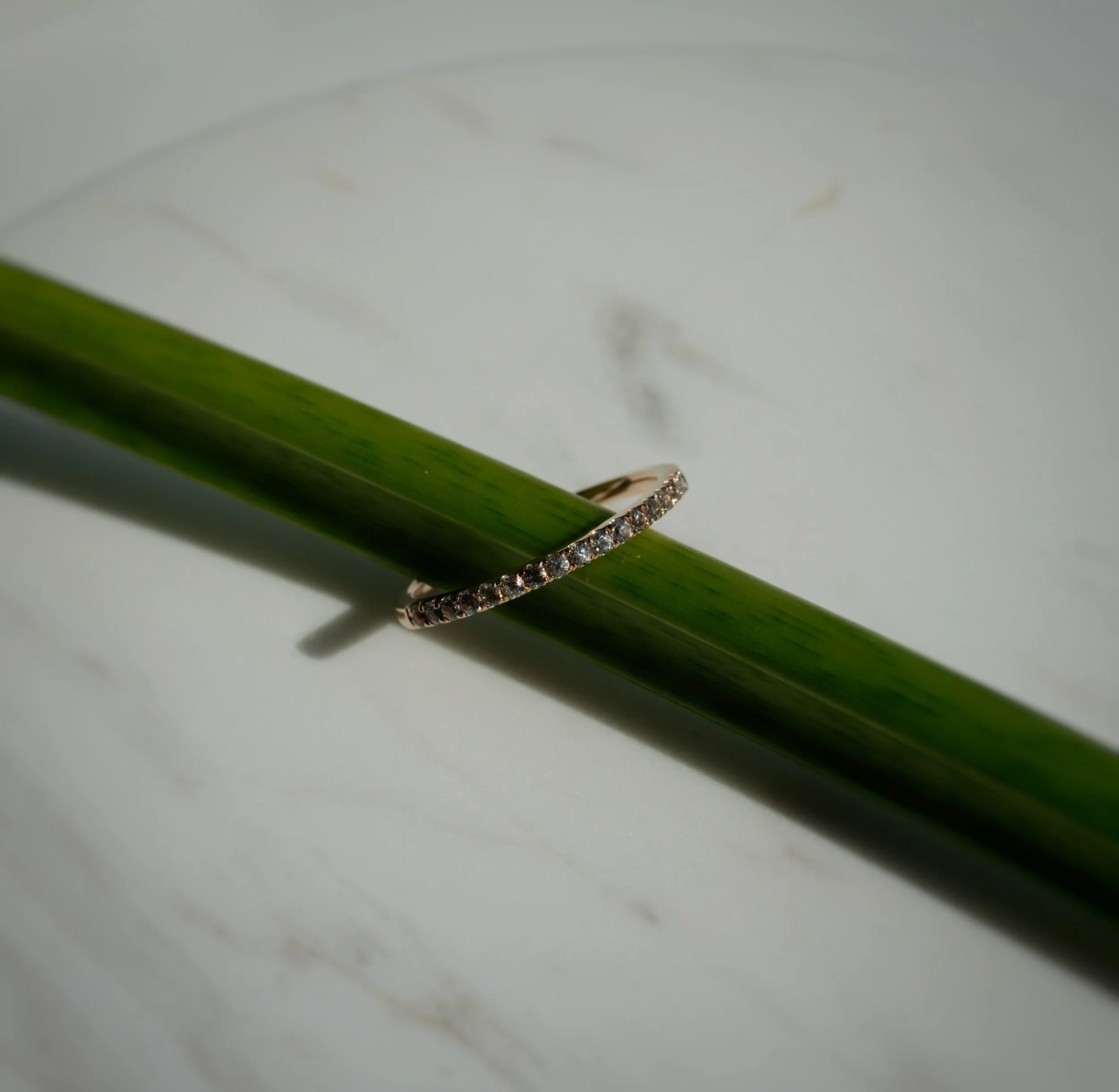 White gold light green sapphire ring