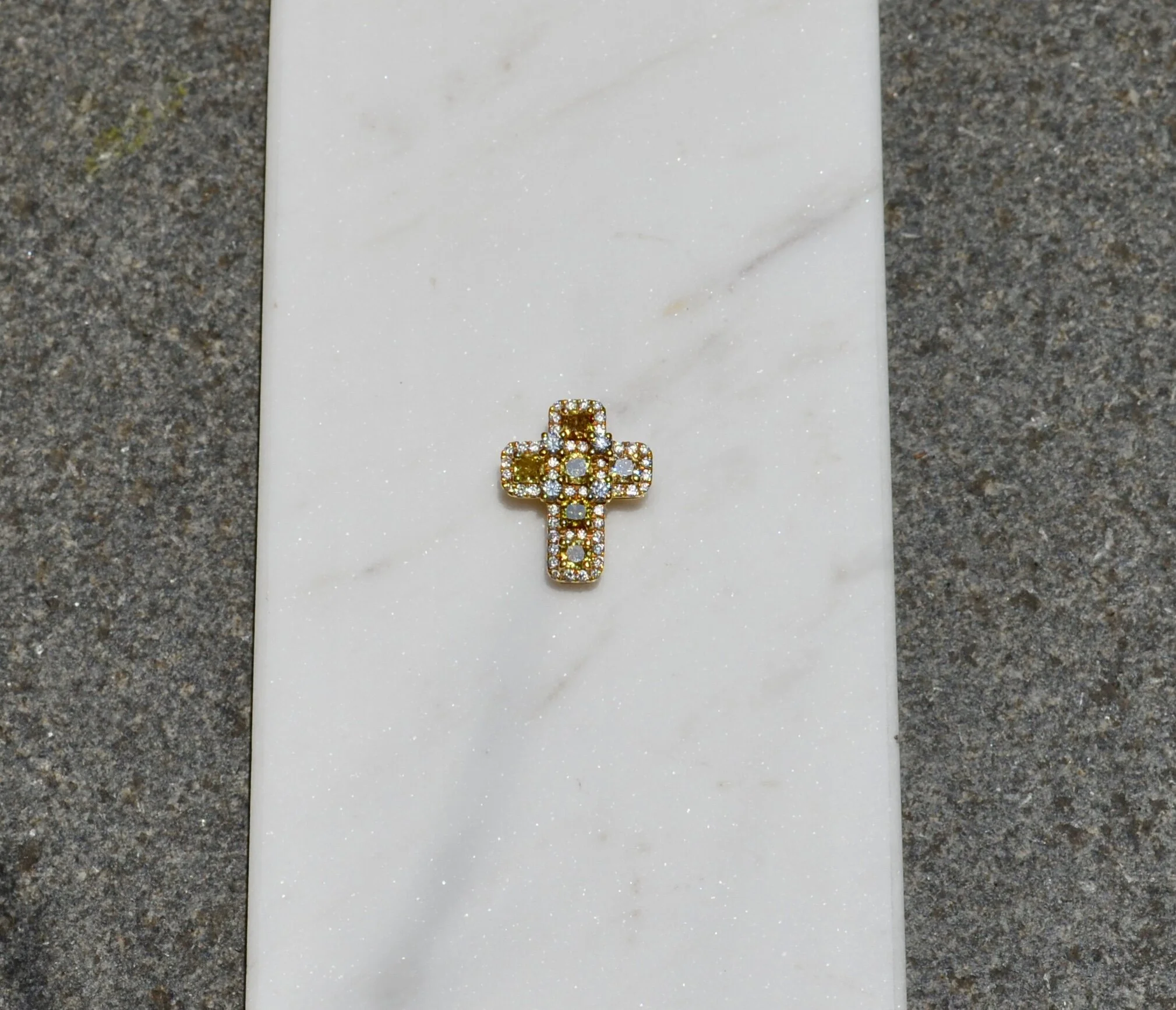 Gold cross pendant