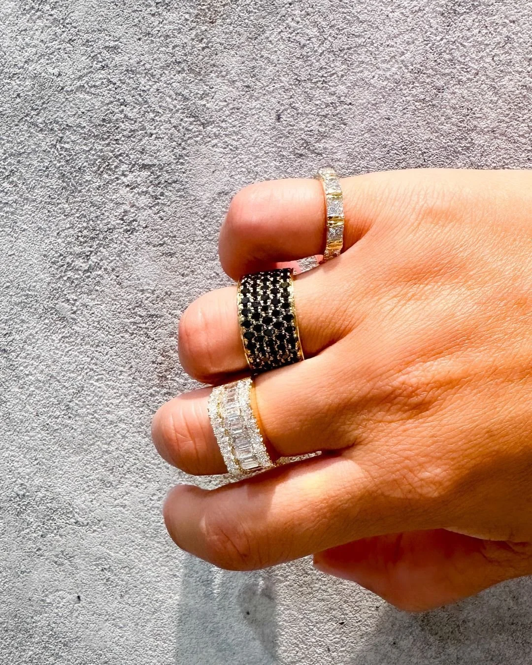 Nothing needs to match, different cuts, different stones and the gold holding it all together. That&rsquo;s where it gets interesting. #blackdiamondring #emeraldcutdiamond #princesscutdiamond #rounddiamond #diamondrings #stackedrings #finejewellery #