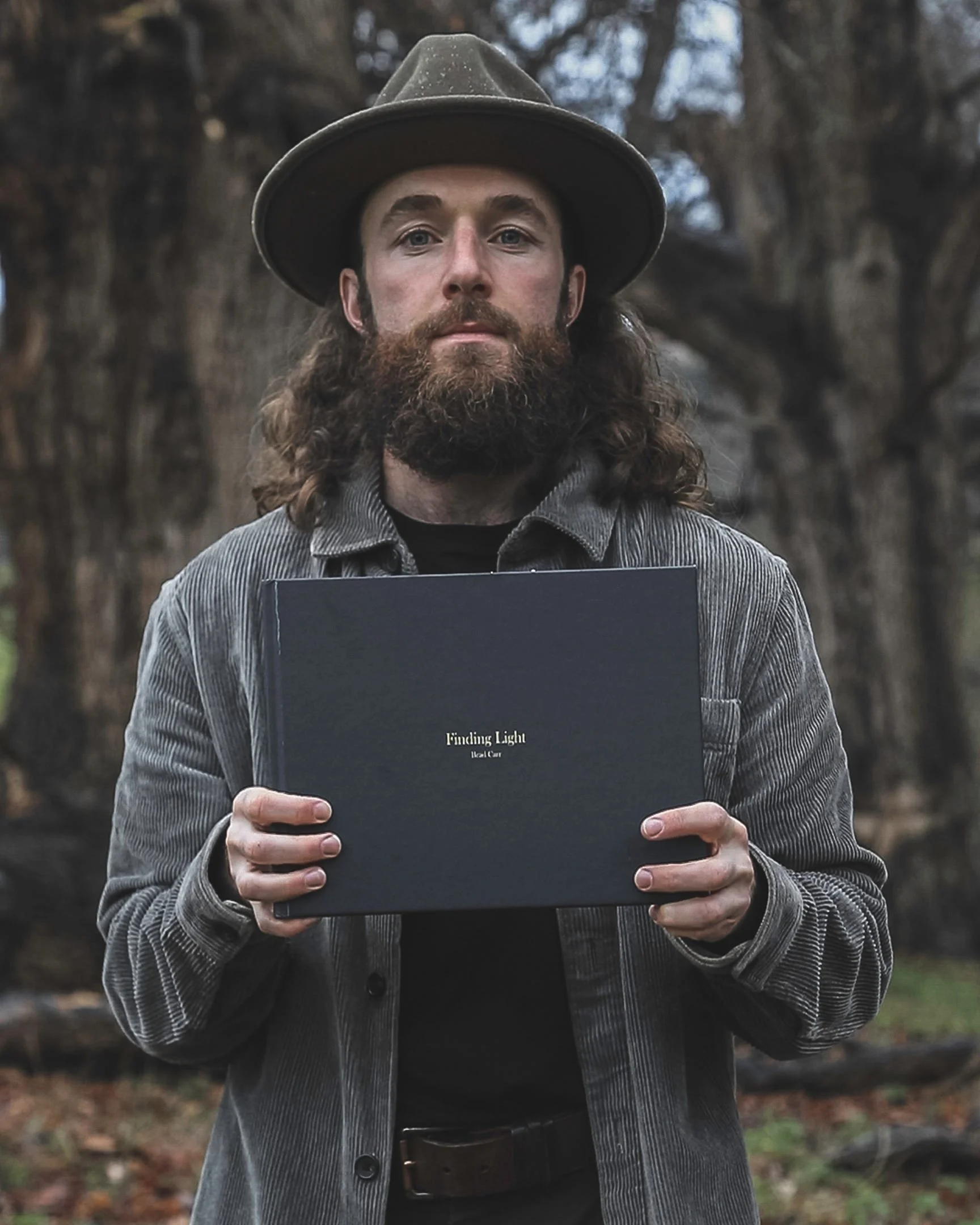 Brad Carr with Finding Light Book ©Brad Carr.jpg