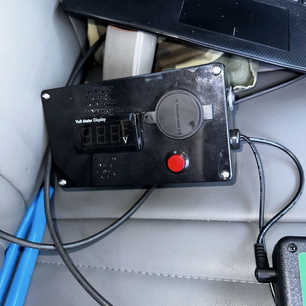 Homebrew powerpack containing a Bioenno 3Ah LiFePO4 battery, speakers and a "on demand" voltmeter with a pair of anderson powerpole connectors