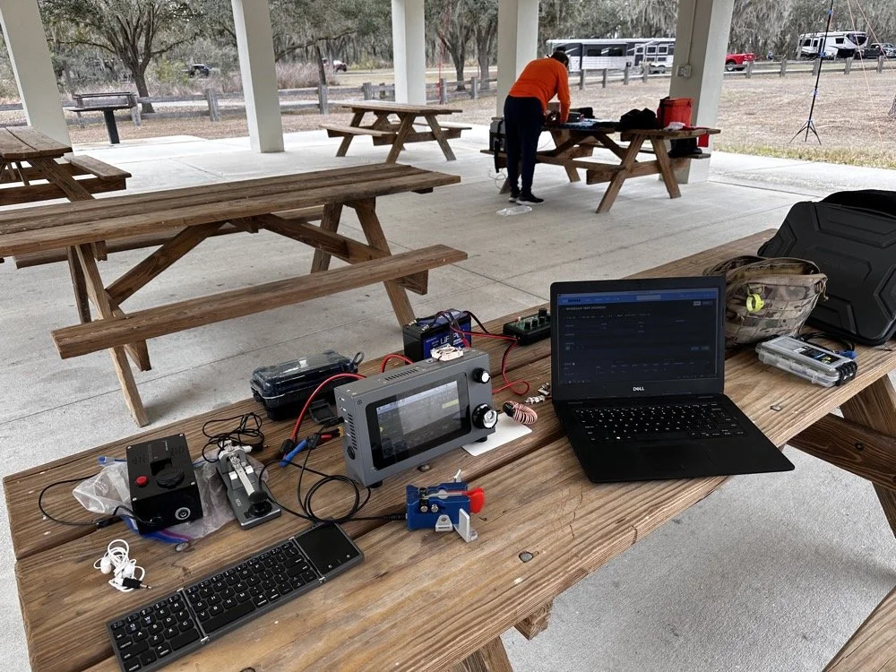 sBitx v3 QRP transceiver with MFJ-941 antenna tuner Dell laptop and CW paddle POTA field station setup