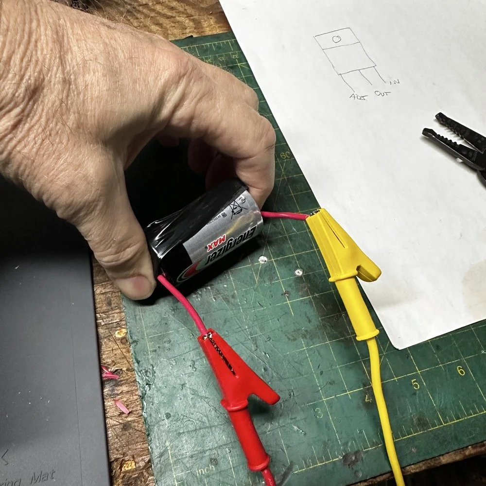 Energizer battery under test in the home lab after the voltage monitor circuit found the battery bank output low.