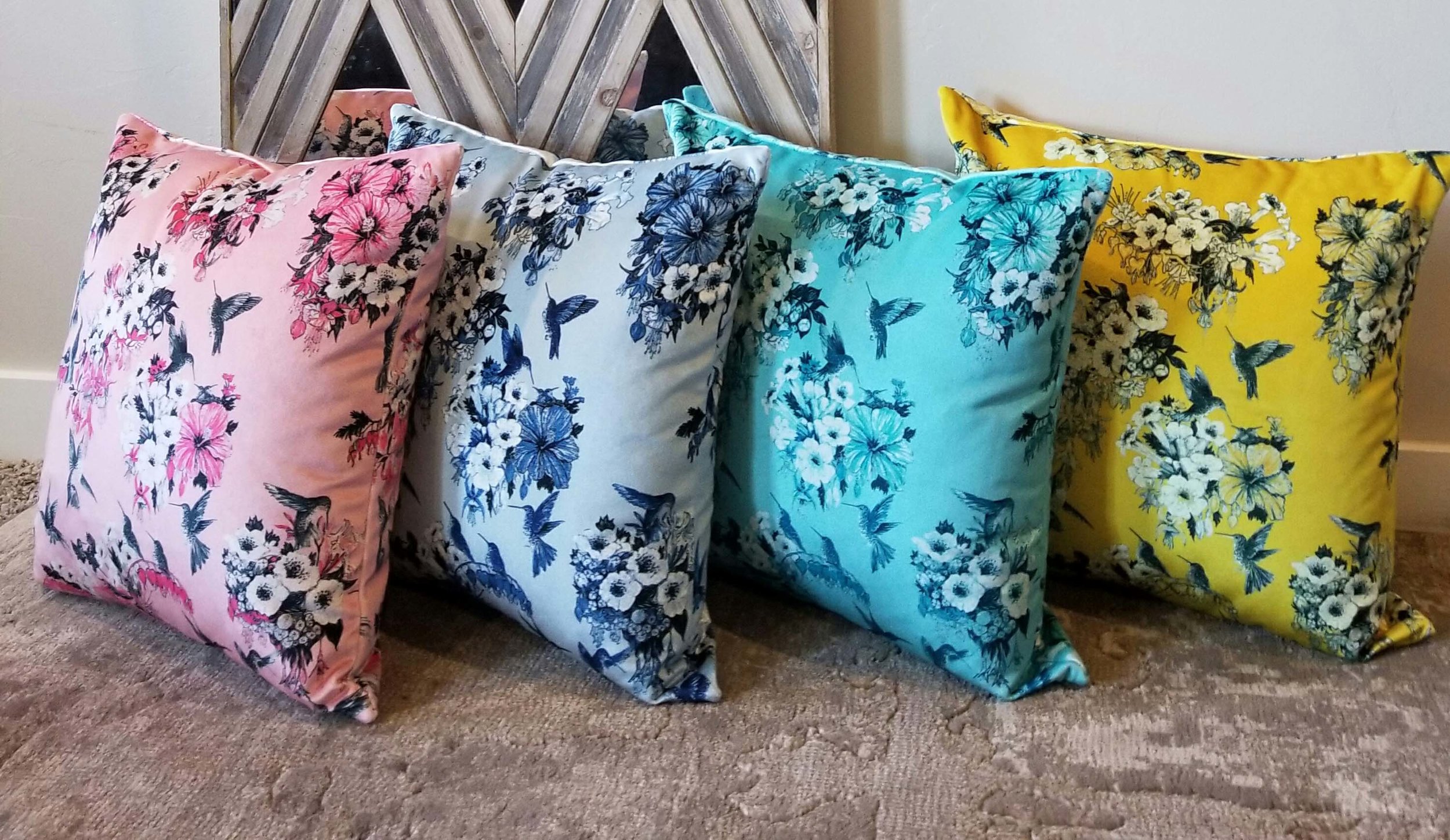 Set of colored floral printed fabric pillows