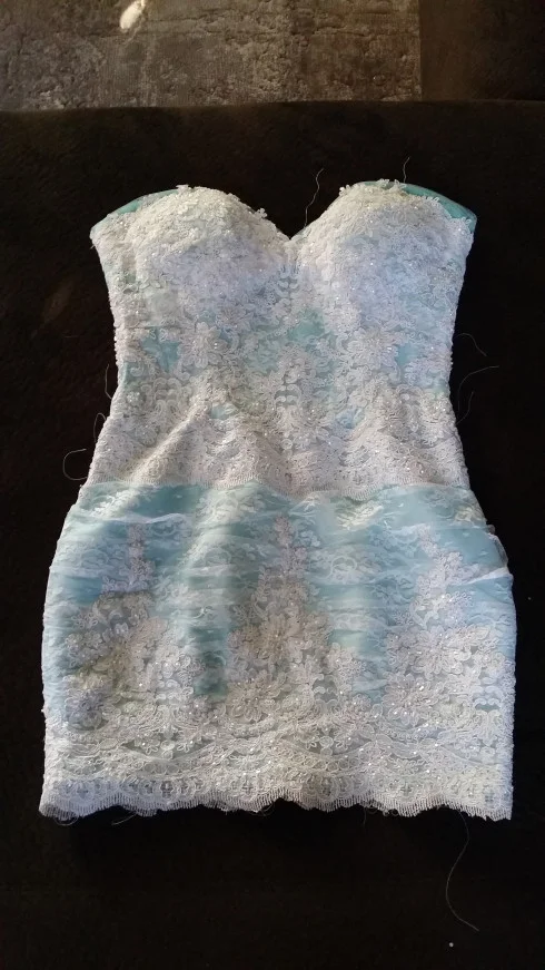 Tiffany blue dress covered with white lace