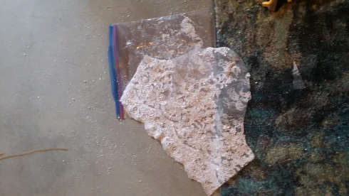 A piece of white lace on the floor