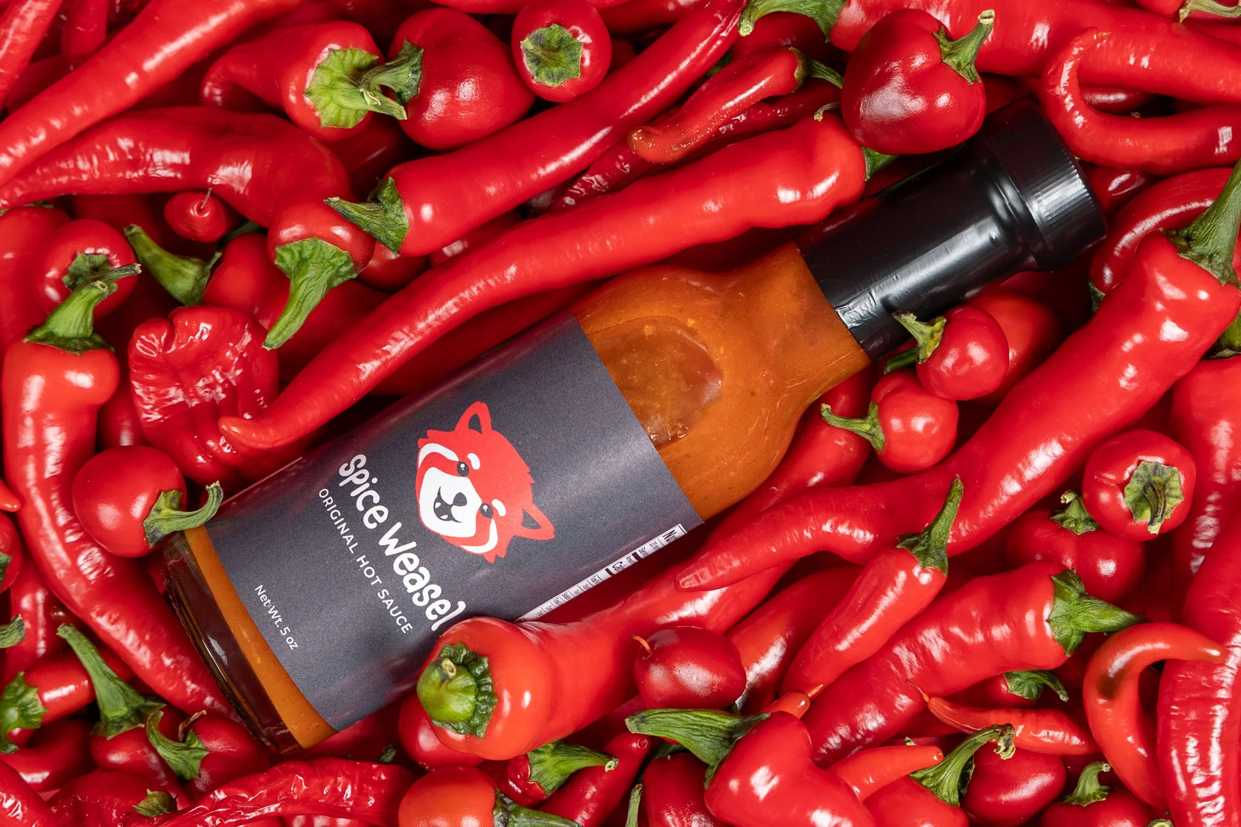 Spice Weasel - Backyard Peppers and Momo Sauces 