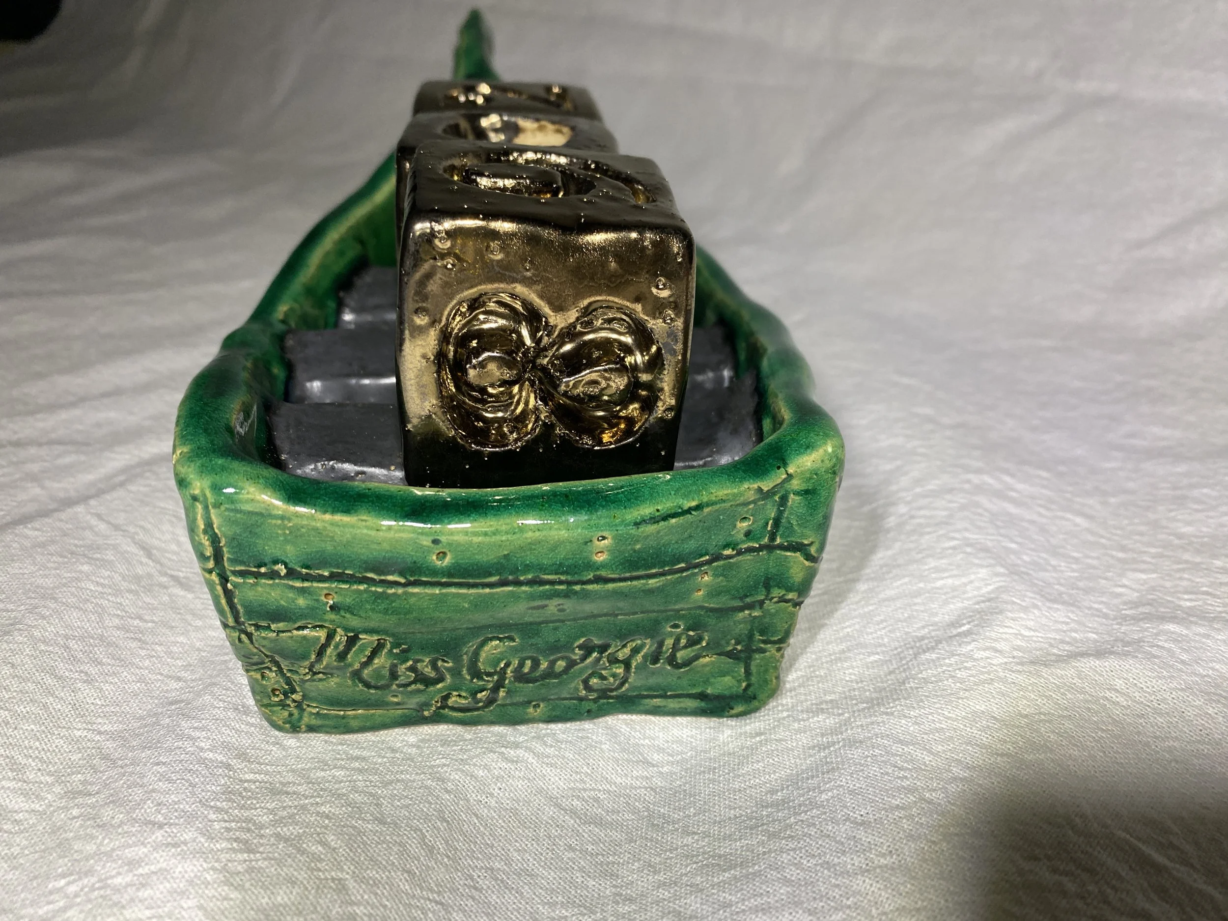 “In a beautiful Pea Green Boat”