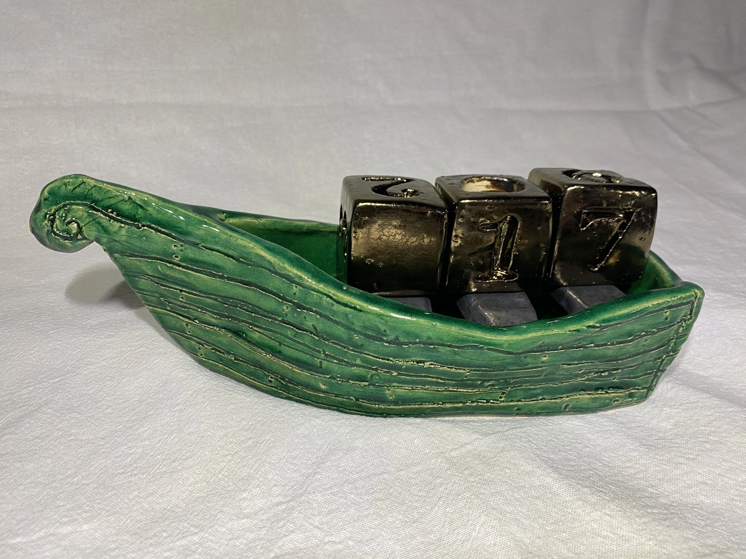 In a beautiful Pea Green Boat