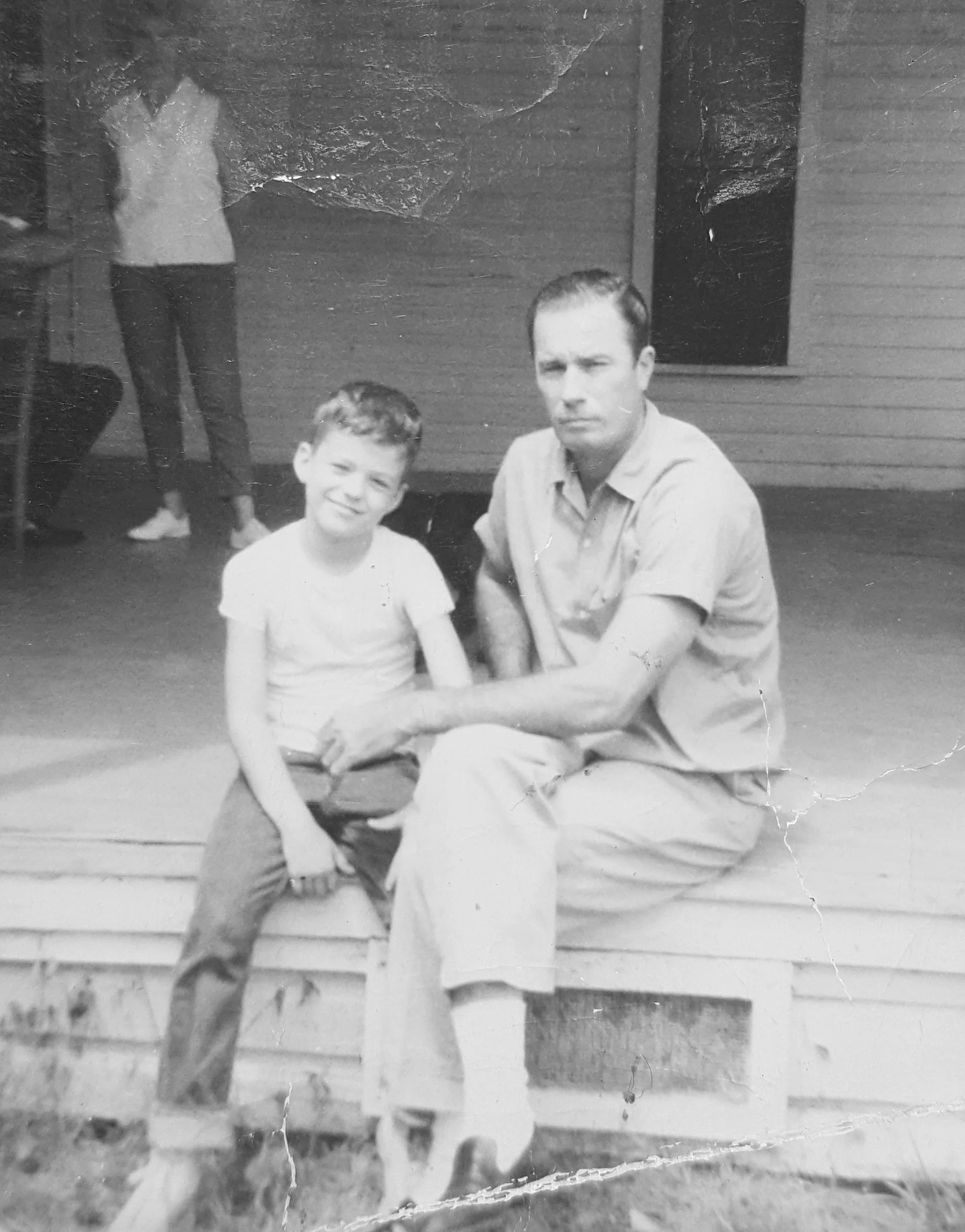 Mark Wynn as a boy with his stepfather