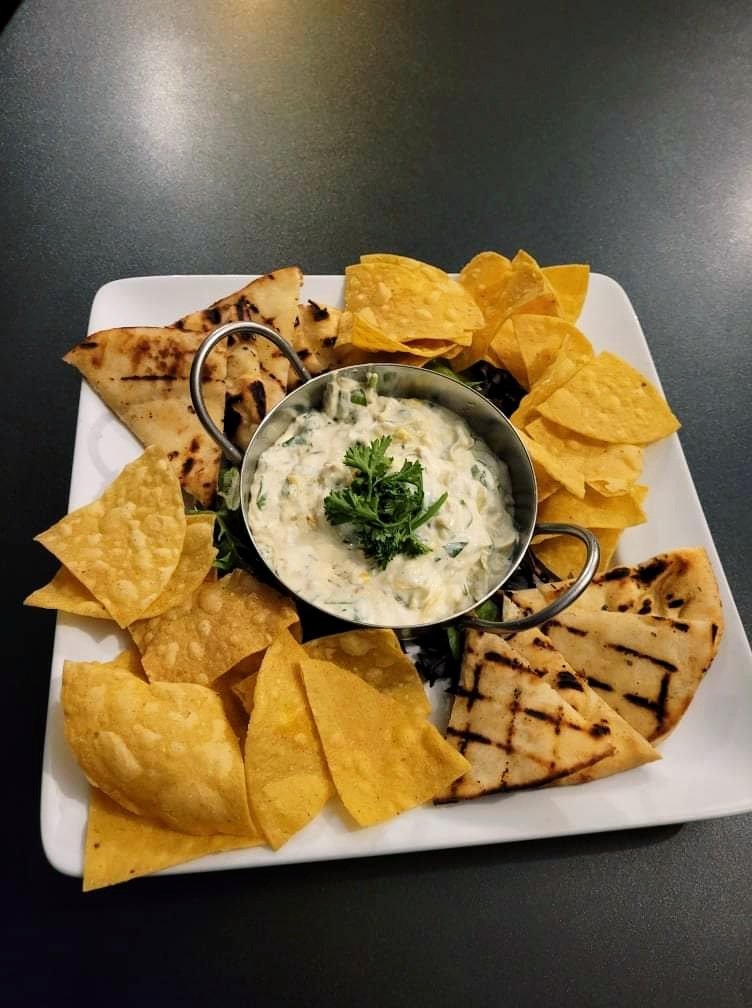 spinach and artichoke with naan and naco chips.jpg