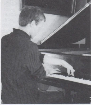 manu playing piano copy.jpg