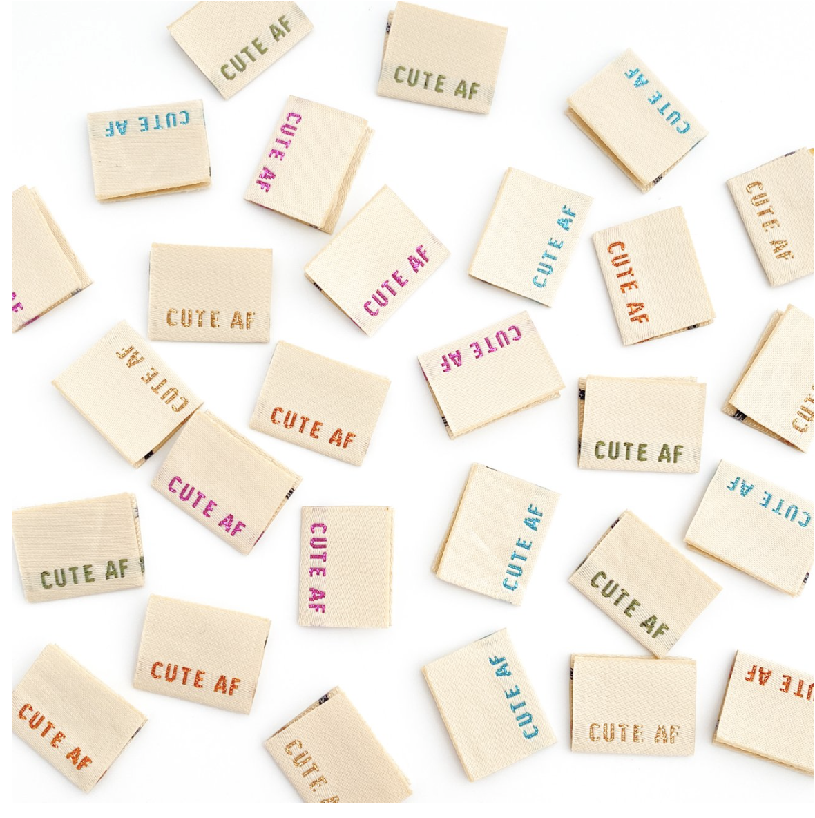 Kylie and the Machine woven labels "Cute AF"