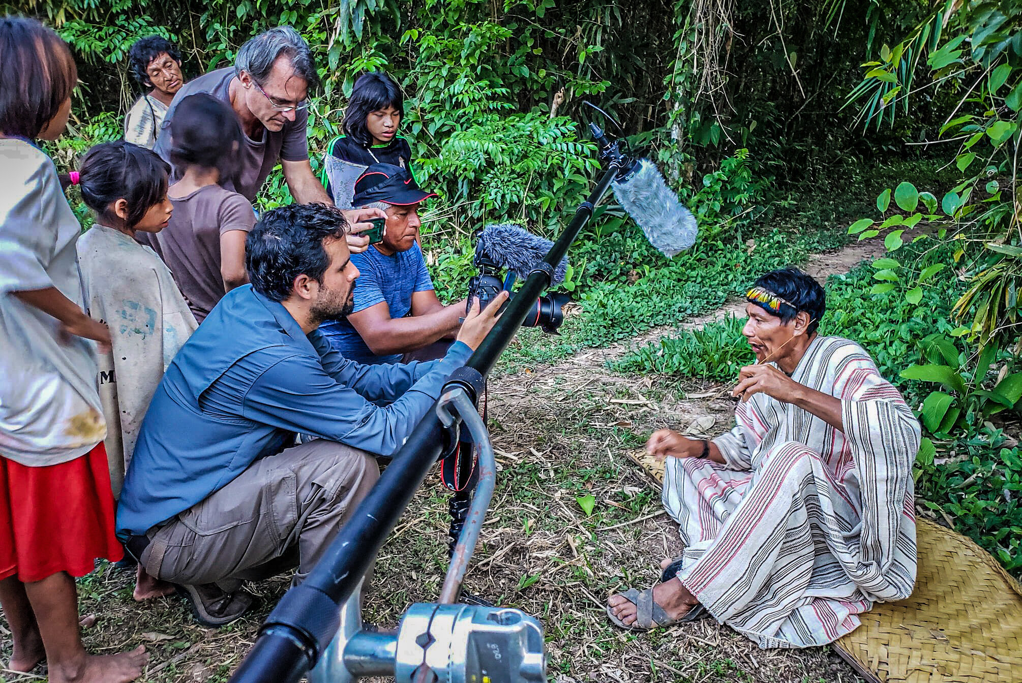 Filming a Matsigenka Shaman within the village of Tayakome inside the intangible zone of Manu National Park.