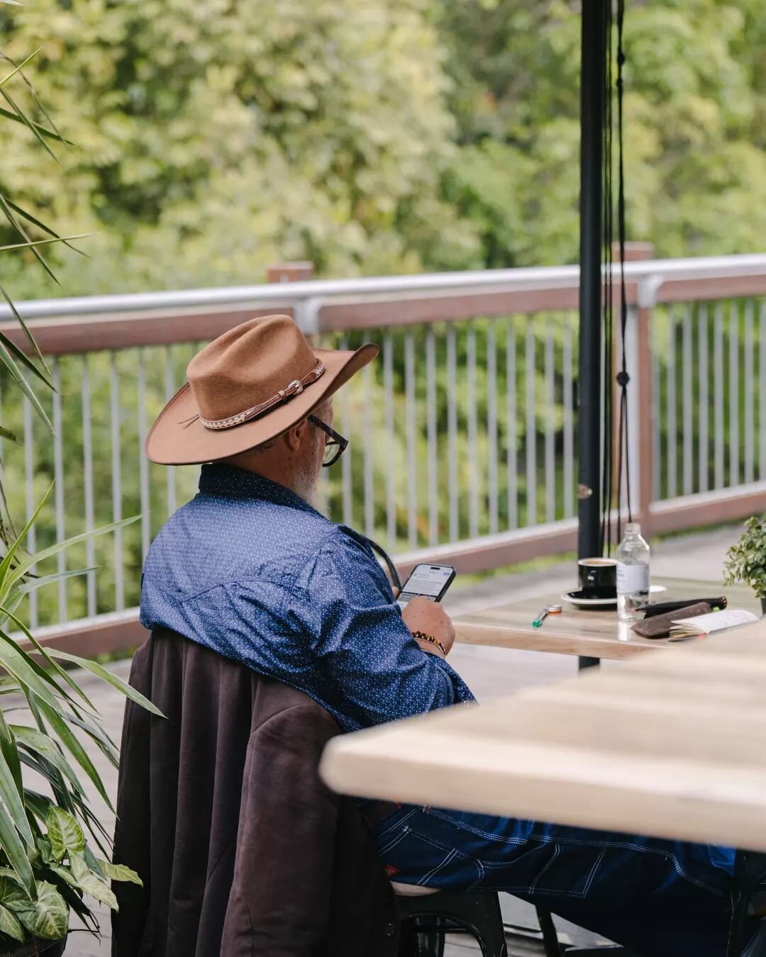 Finding your personal oasis is as simple as a hat, a cup, and a view 🎩📲☕️. Escape into your zone at our cafe, where every corner is an invitation to unwind. 

#CafeCorner #MyEscape #CoffeeBreak #RelaxAndUnwind #PeacefulMoments