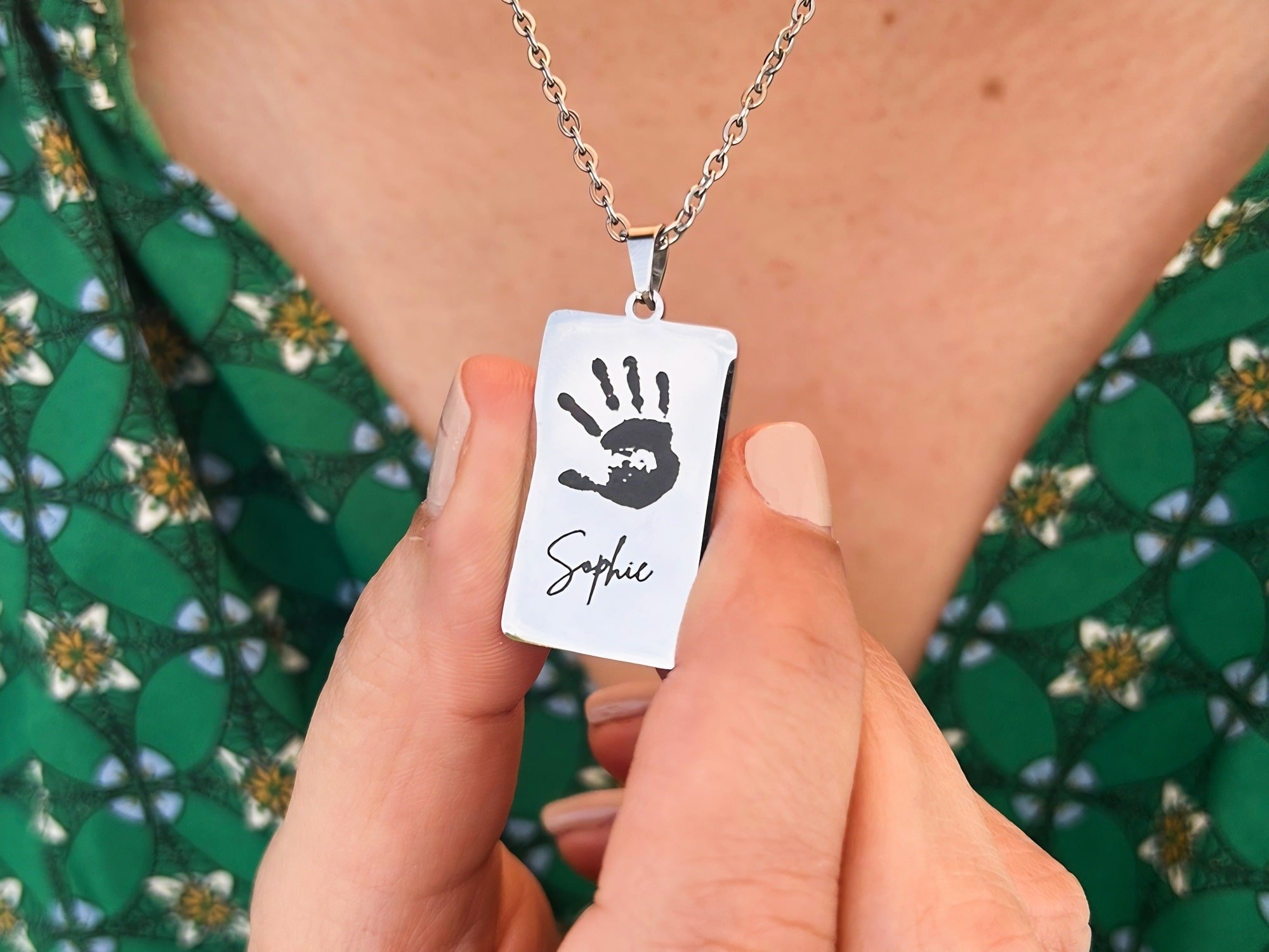 Handprint Silver rectangle held1-min.jpg