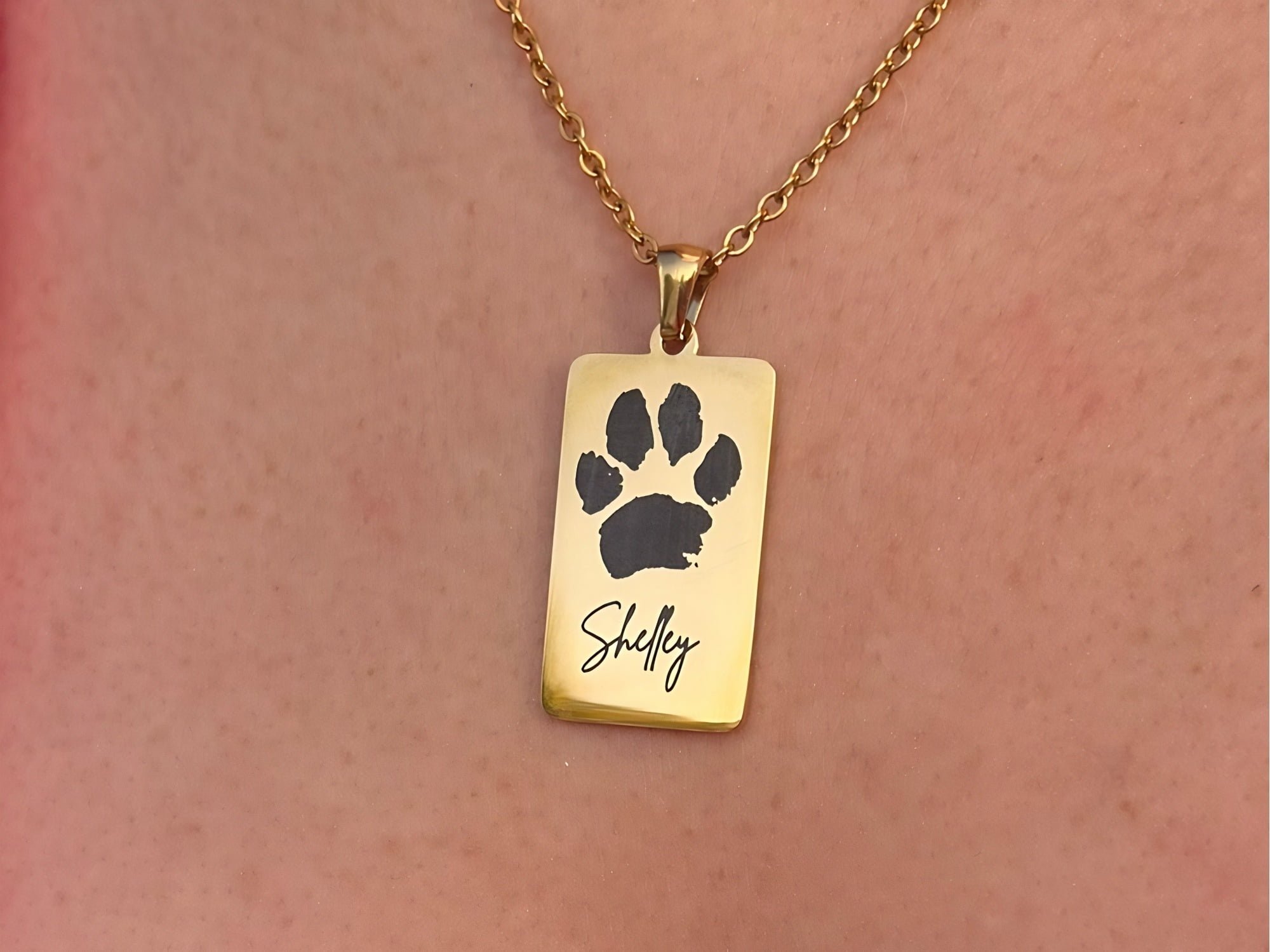Pawprint Rect Gold-min.jpg