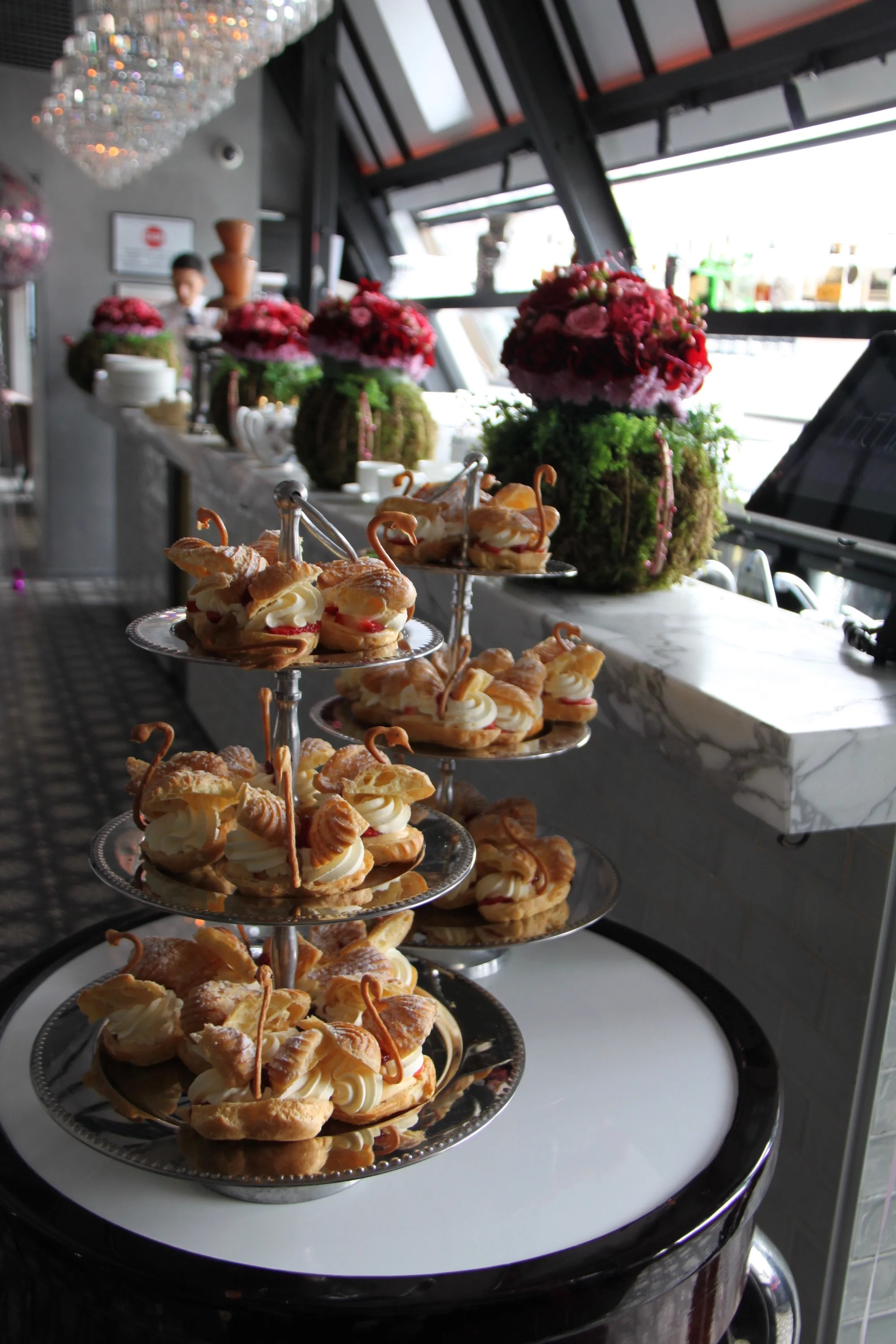 FLOWER AND FOOD DISPLAY AT FIVE STAR RESTAURANT