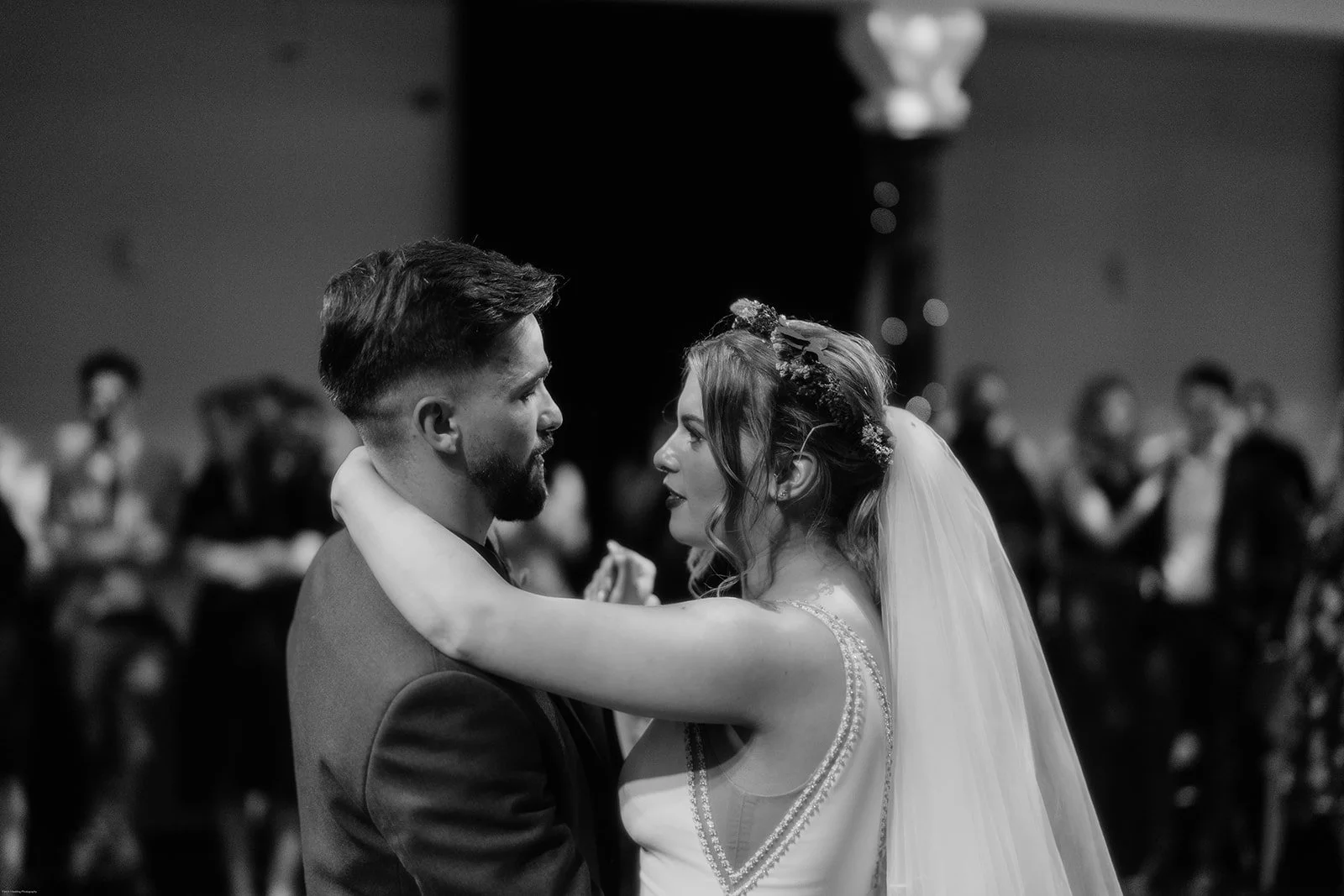 Newlyweds sharing their first dance at Saint Luke’s and The Winged Ox in Glasgow