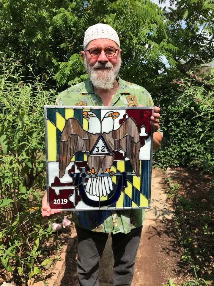 Past Master Schoch showing off our new logo