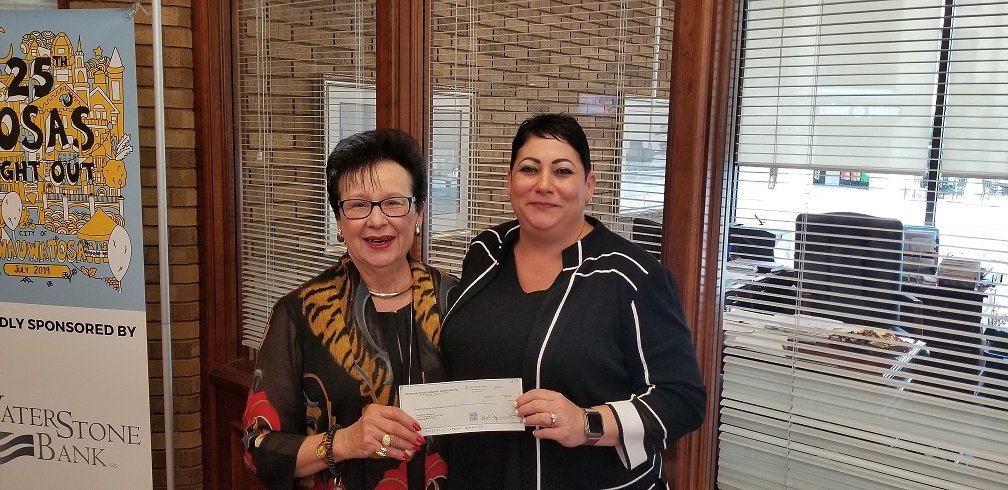 Carol Carey, Community President of WaterStone Bank (left) and Lynnea Katz-Petted, CEO of Revitalize Milwaukee (right).