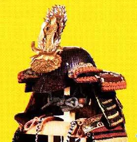 One of Kenshin’s kabuto with a shita-jikoro. This one is made of sane attached to a fabric backing forming a three-panel skirt that defends the neck where the kasa-jikoro won’t. Note that the layers overlap in the reverse way to conventional lamination.