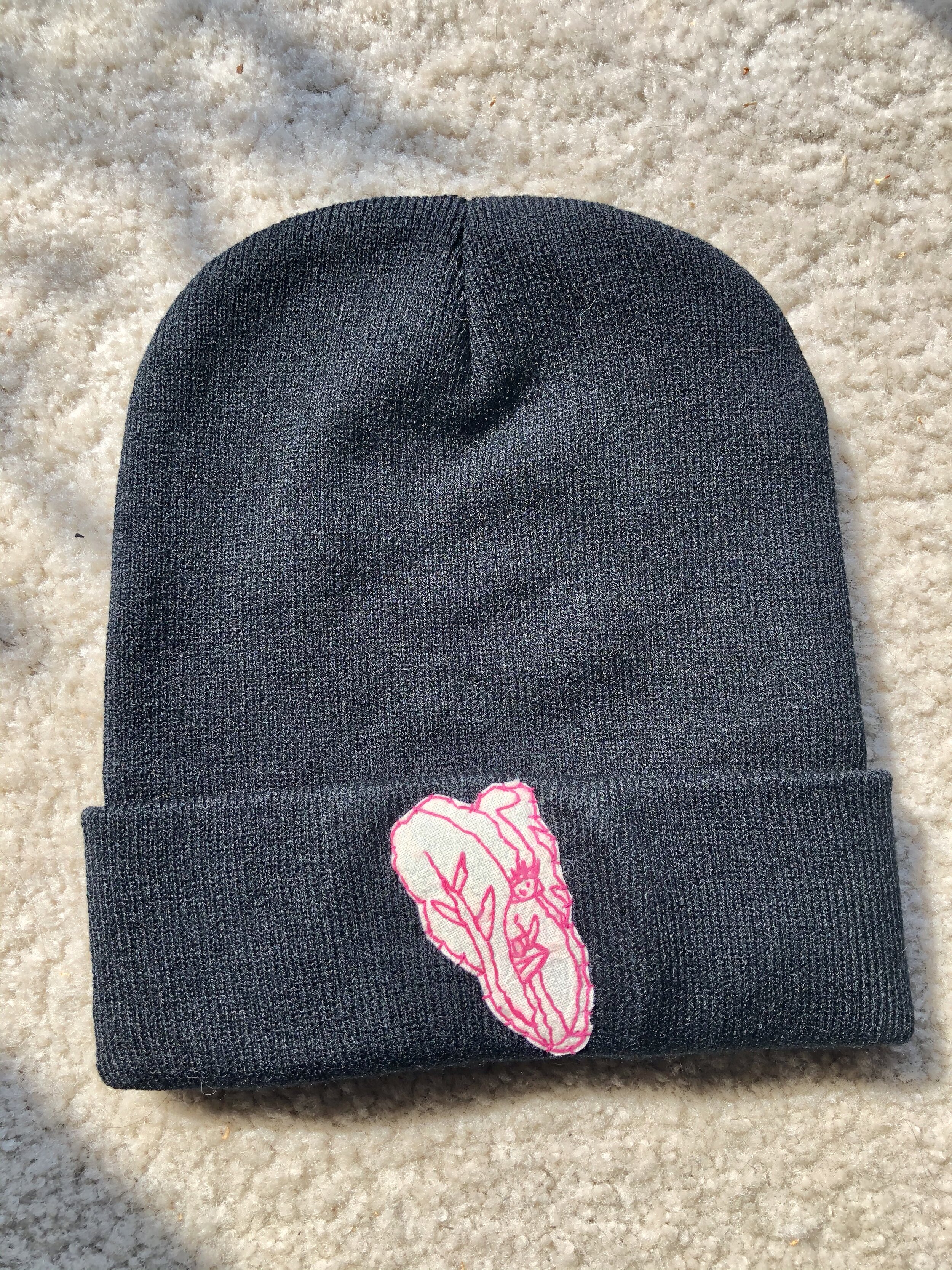AFM beanie with white/pink logo