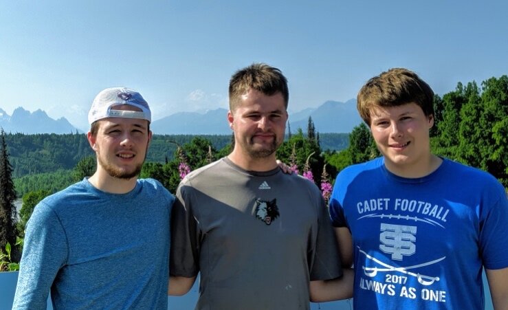 Conor with brothers Patrick and Rory