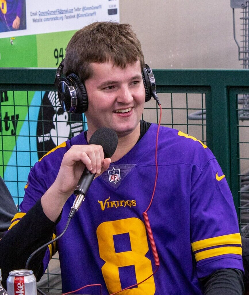 Conor behind the Mic at the 1st Anniversary Show. Photo Cred Braden Williams