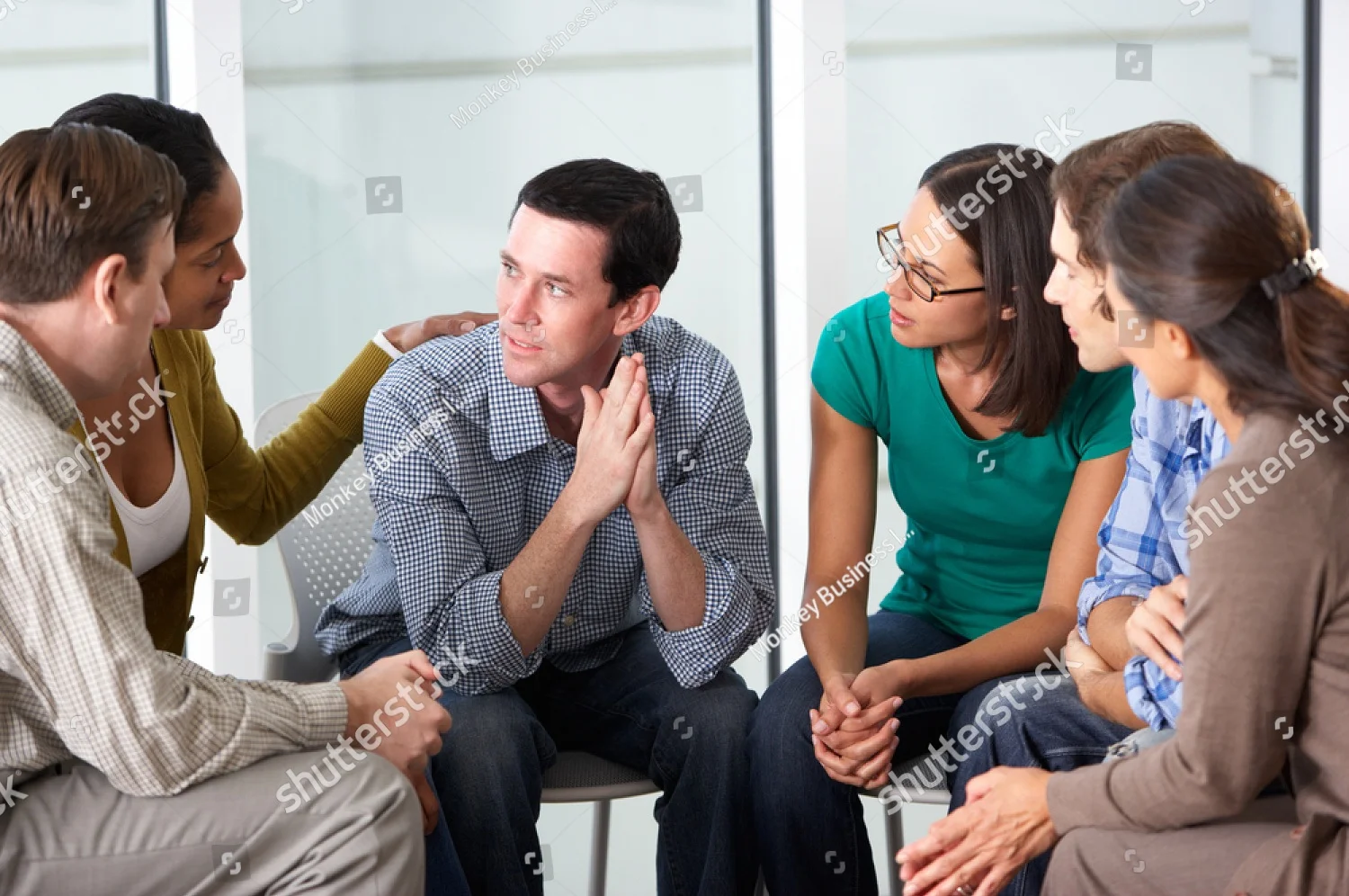 stock-photo-meeting-of-support-group-141036160.jpg