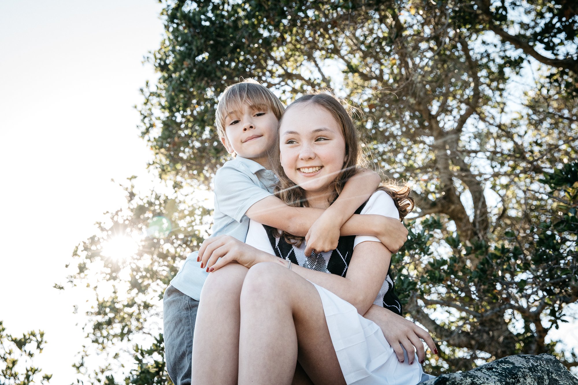 family photography session for family of three at sunset, Ring M