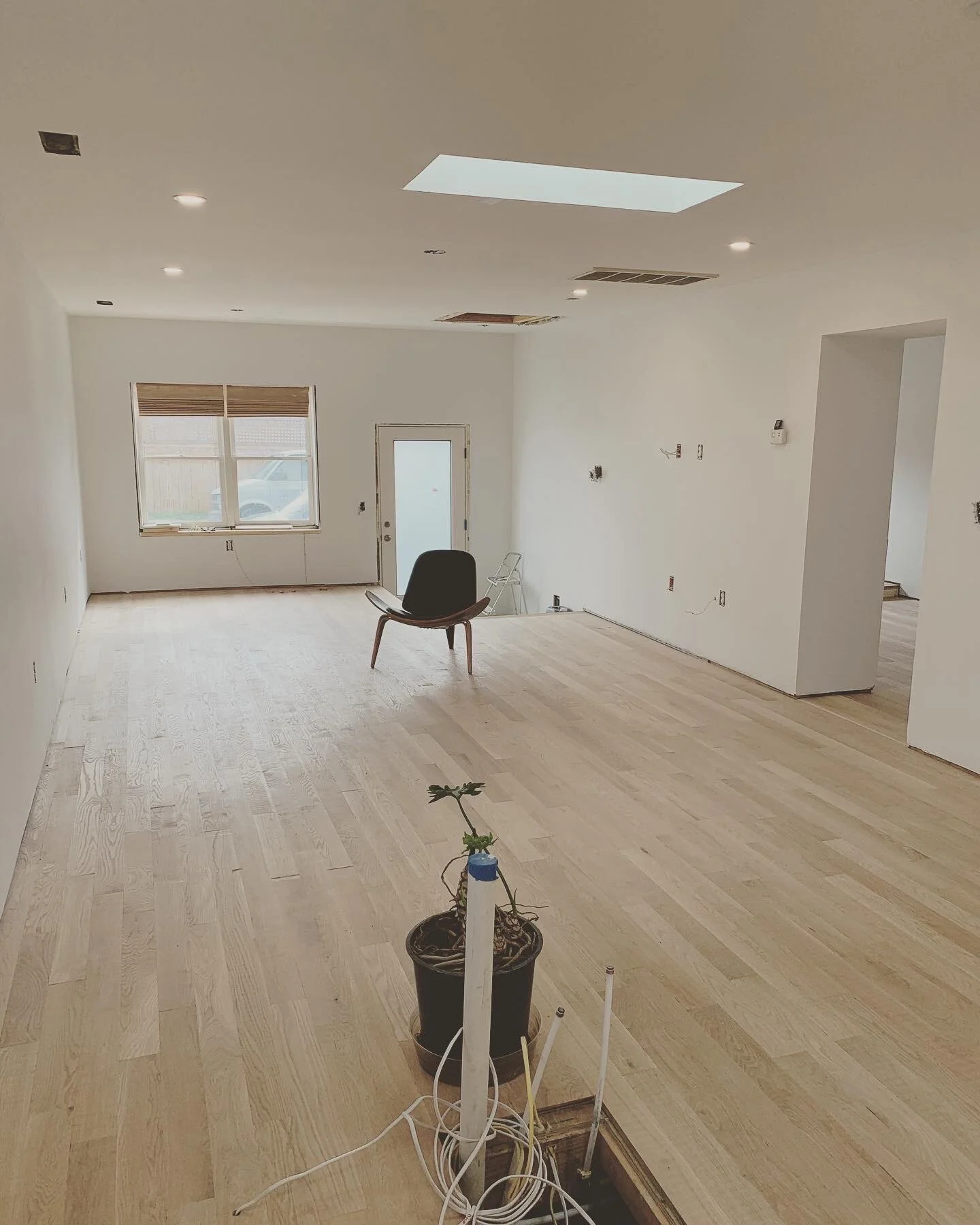 3_ LIVING ROOM AFTER FLOORS.JPG